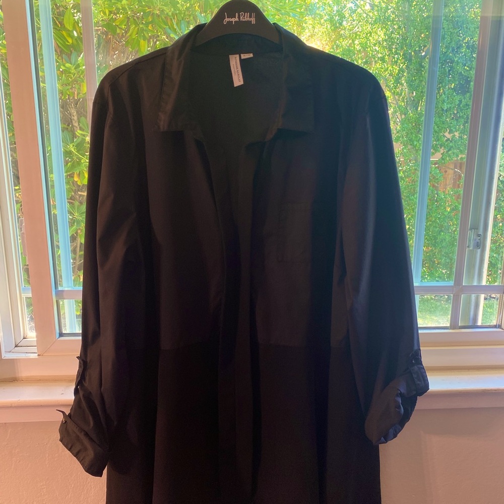 Katherine Barclays black button up shirt